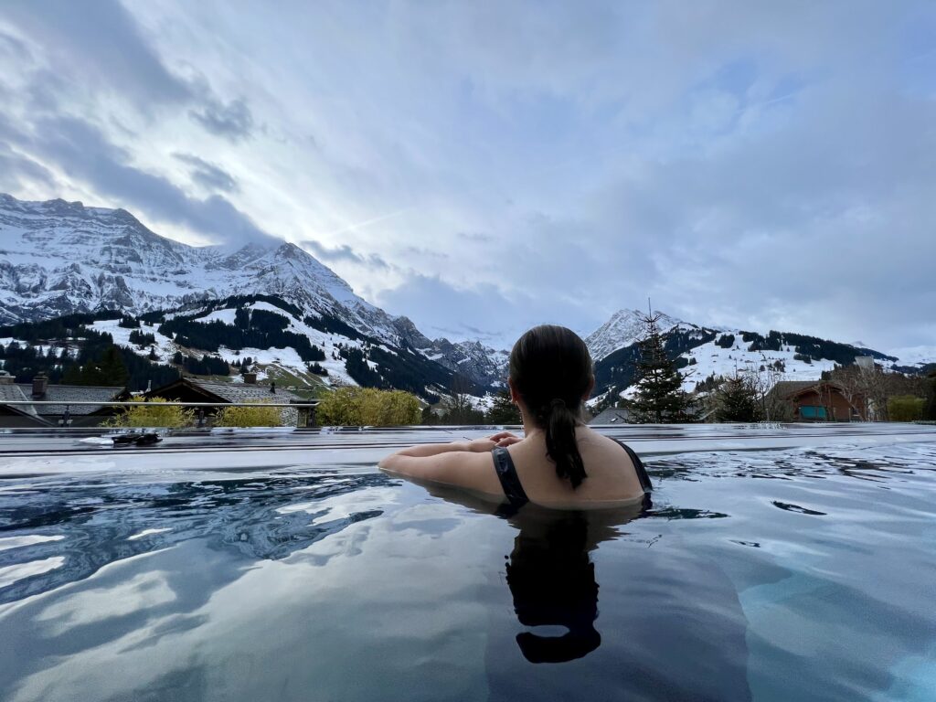 Julie Enjoying the Heated Pool with a Stunning View