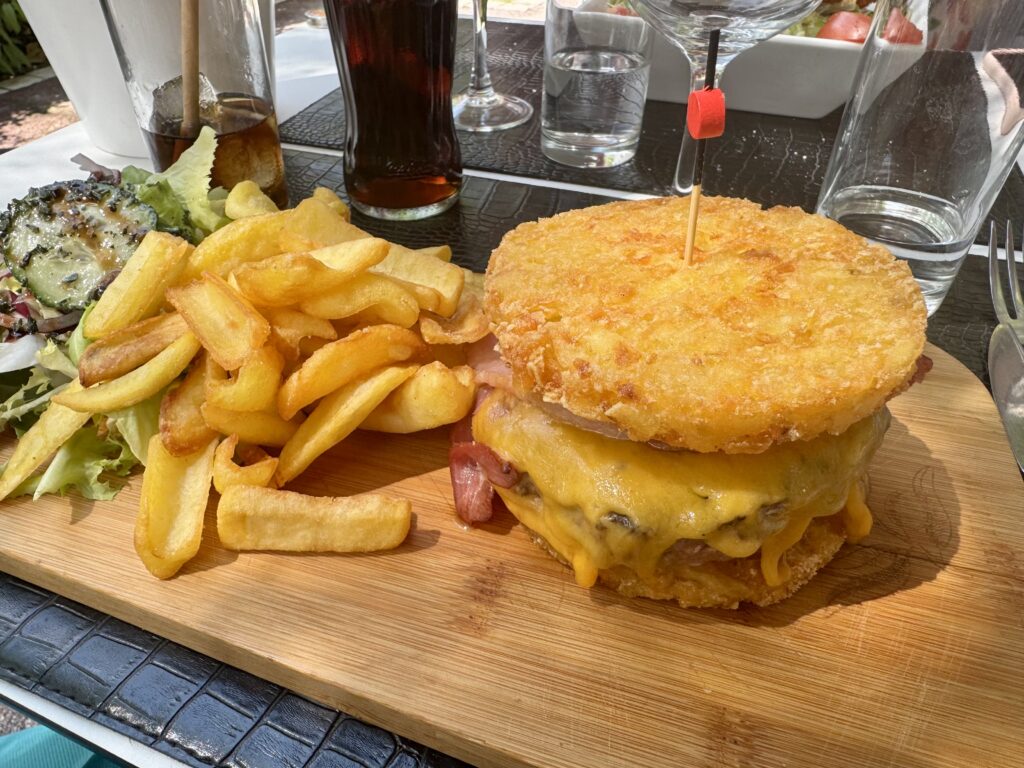 Café De Paris Hamburger Served Between Hashbrown Patties