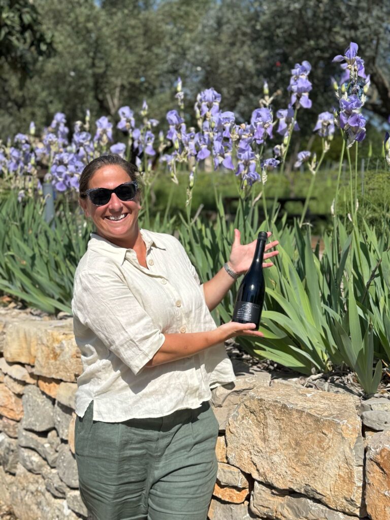 Julie Showing off a Purcahse at Château Saint-Esprit