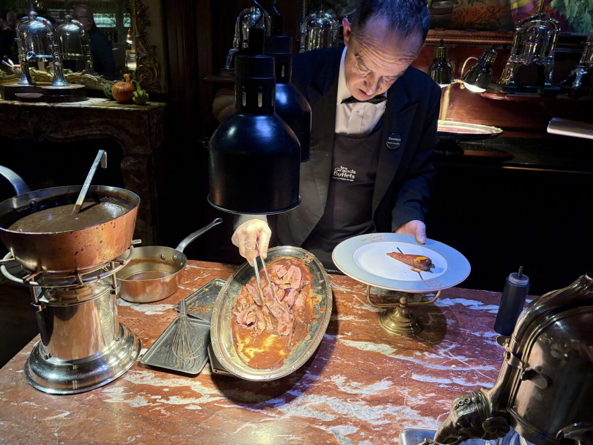 The Duck Being Plated at Les Grands Buffets