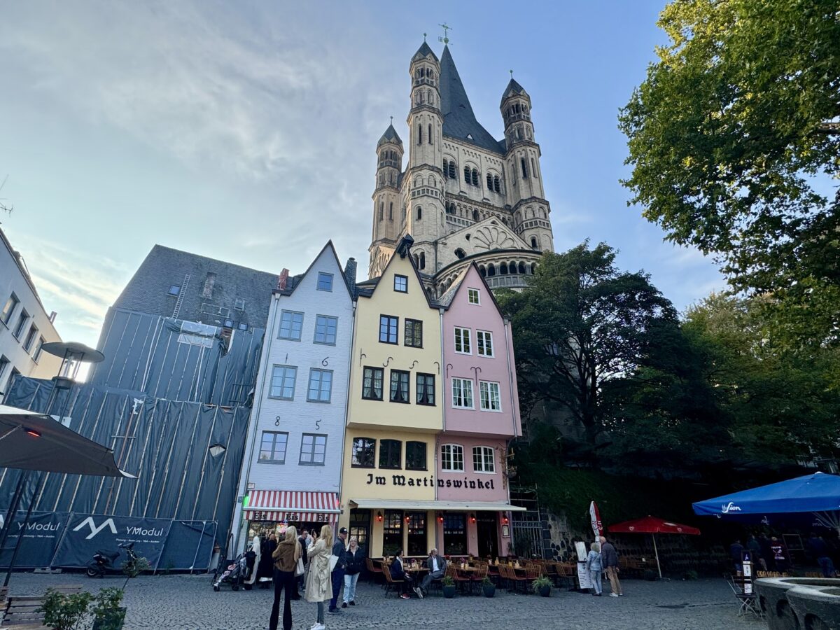 Colorful Houses in front of Great St. Martin Church